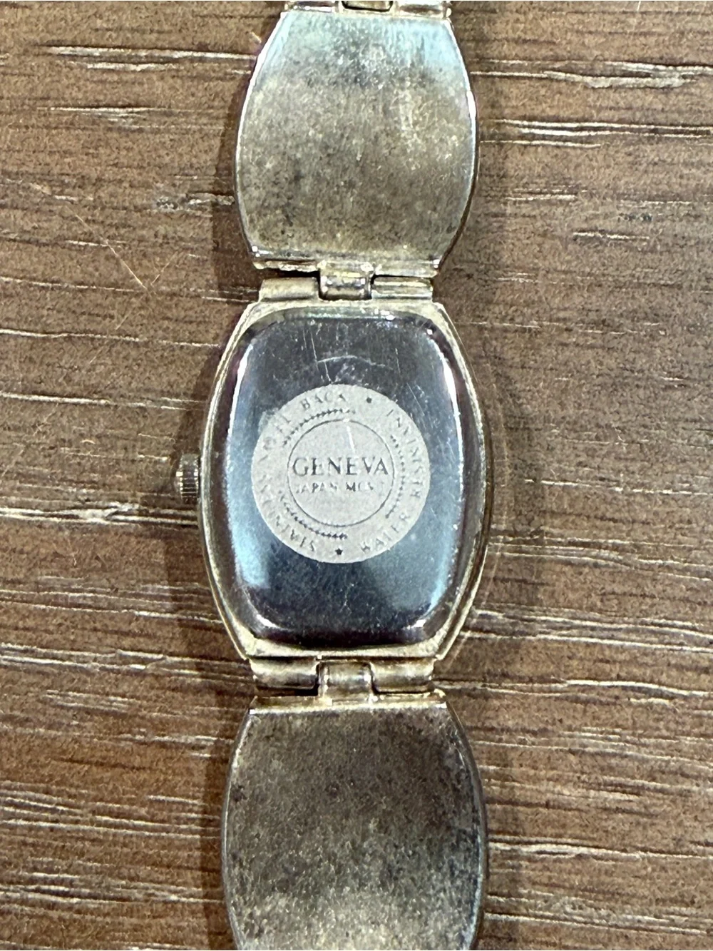 Vintage Geneva stainless steel back waterproof silver tone bracelet watch